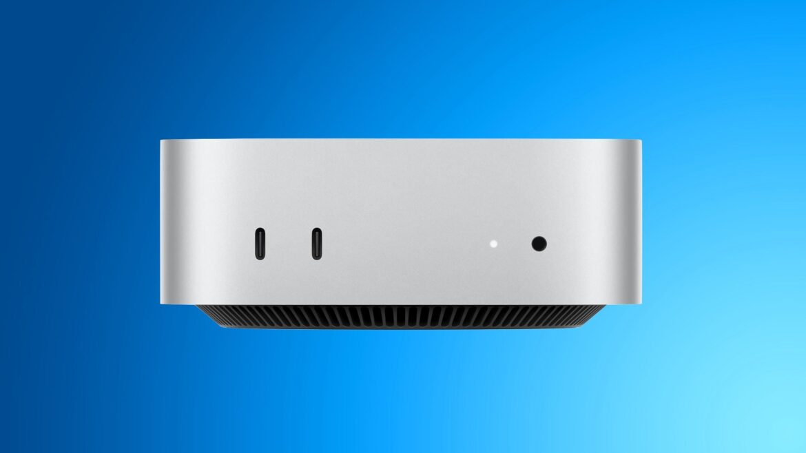 Новий Mac mini з чипом M6 на блакитному фоні, вид з верхньої сторони пристрою зі вбудованим охолодженням