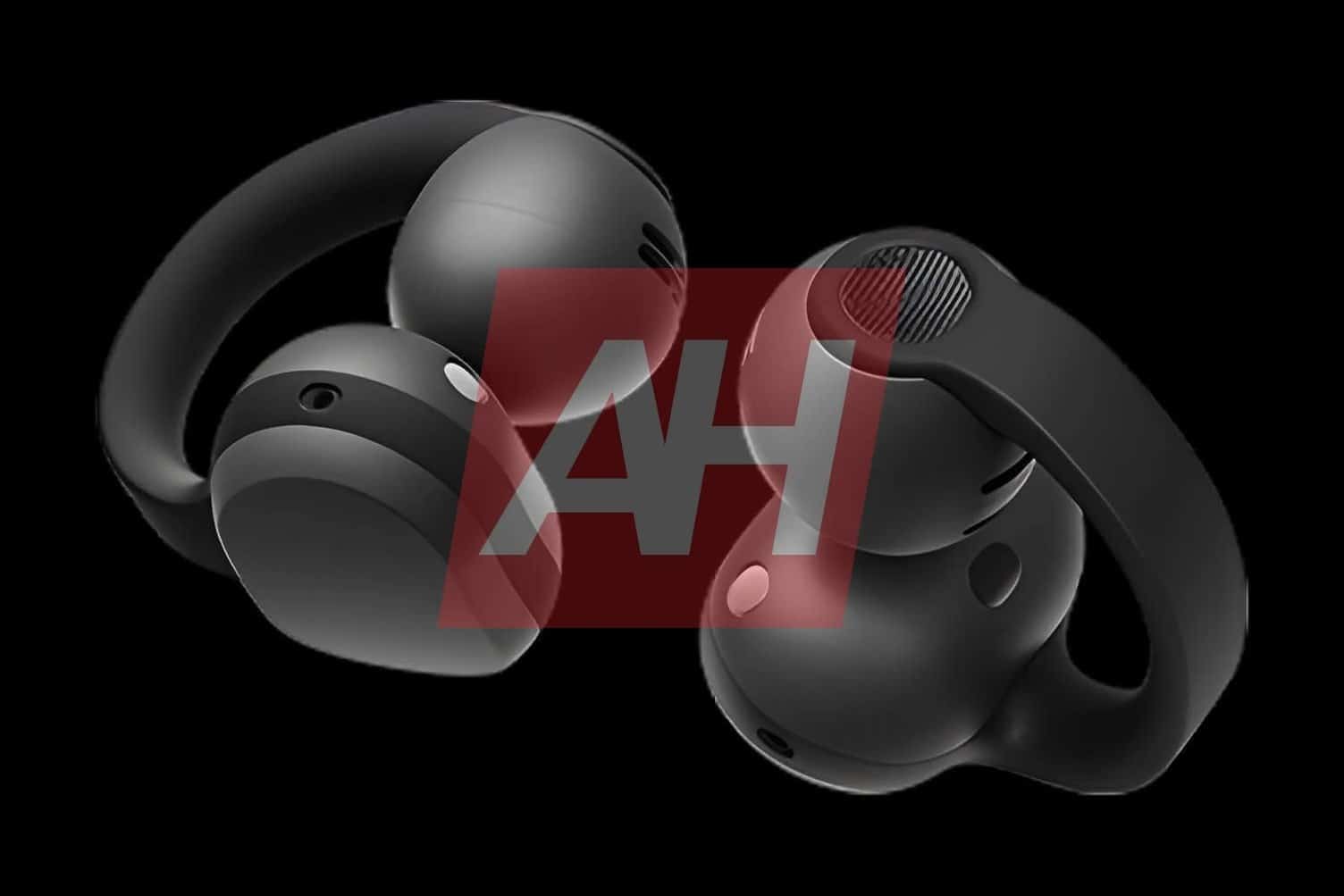 Пара чорних навушників-кліпс Galaxy Buds On з логотипом AH на темному фоні, вид спереду