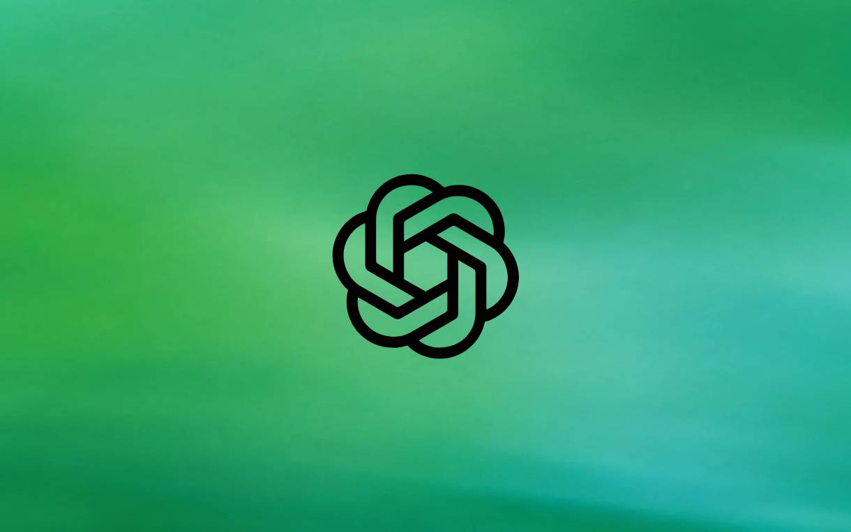 Логотип OpenAI з чорним символом на бірюзовому фоні