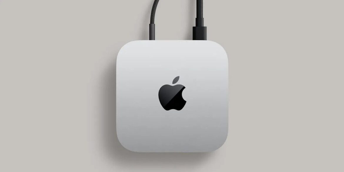 Mac mini з логотипом Apple та кабелями на сірому фоні, ілюстрація до статті про посилення контролю конфіденційності в macOS