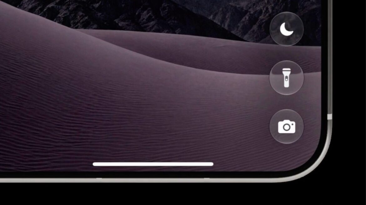 Екран блокування iPhone Duo з піщаною дюною та піками скель, боковою панеллю керування з іконками ліхтарика, камери та режиму