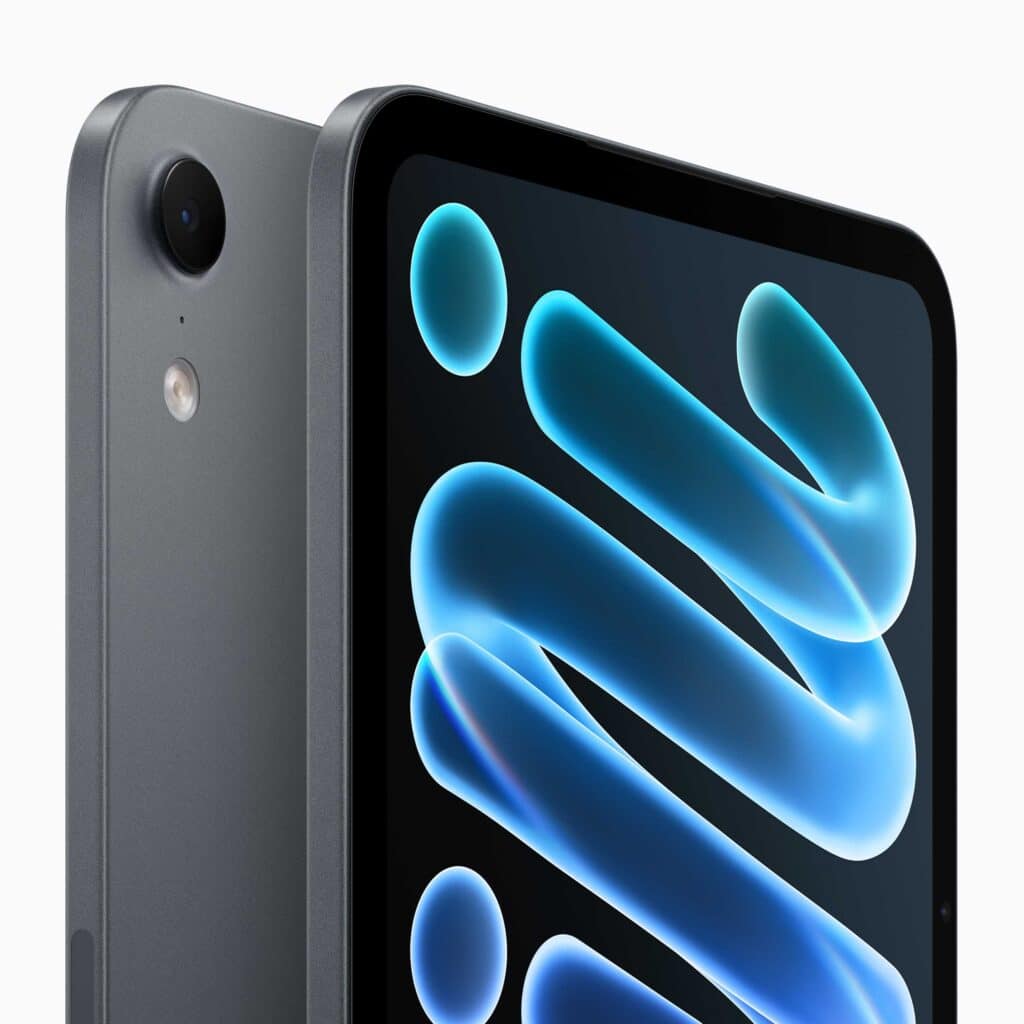 IPad mini темно-сірого кольору під кутом, видно задню камеру та екран із блакитними світними формами