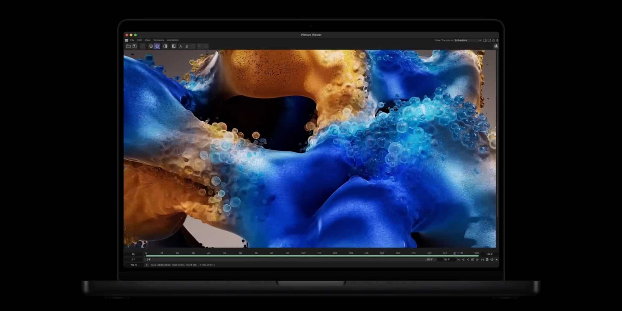 Екран MacBook Pro з відкритою програмою для редагування, на якій відображається динамічна хвиля синього та оранжевого