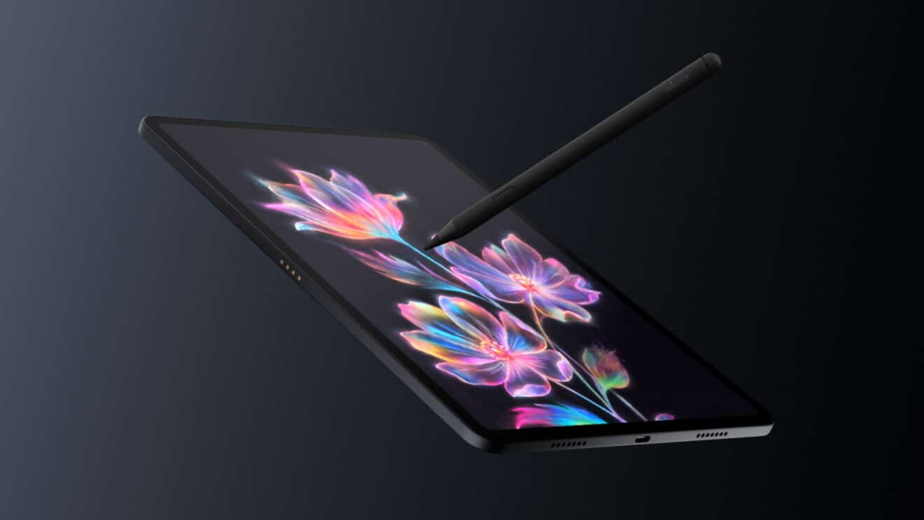 Планшет Amazon Alexa Tablet з кольоровим абстрактним візерунком на екрані, розташований під кутом зі стилусом поруч
