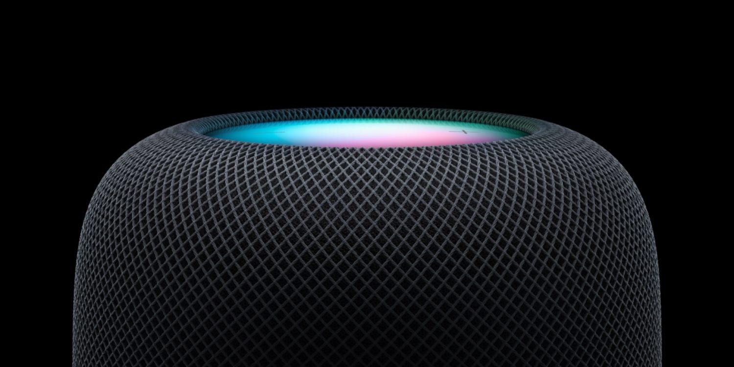 HomePod 2 з підсвіченою верхньою панеллю, що демонструє функцію Sound Glow з кольоровою анімацією