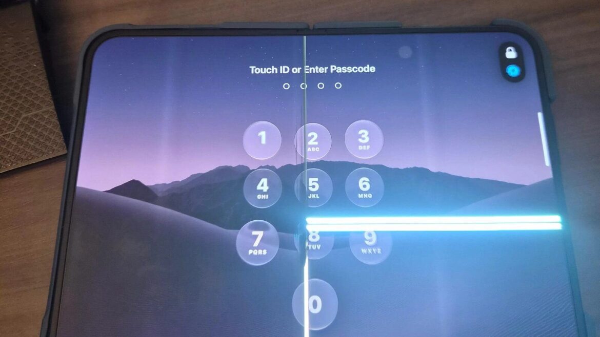 Екран блокування iPhone Duo з яскравими вертикальною та горизонтальною лініями на дисплеї