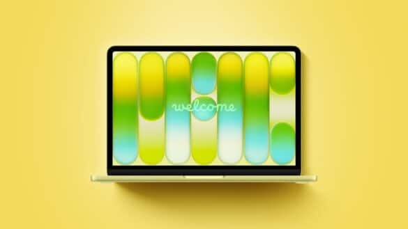 MacBook Neo з екраном із жовто-зелено-блакитними заокругленими смугами і написом welcome на жовтому тлі